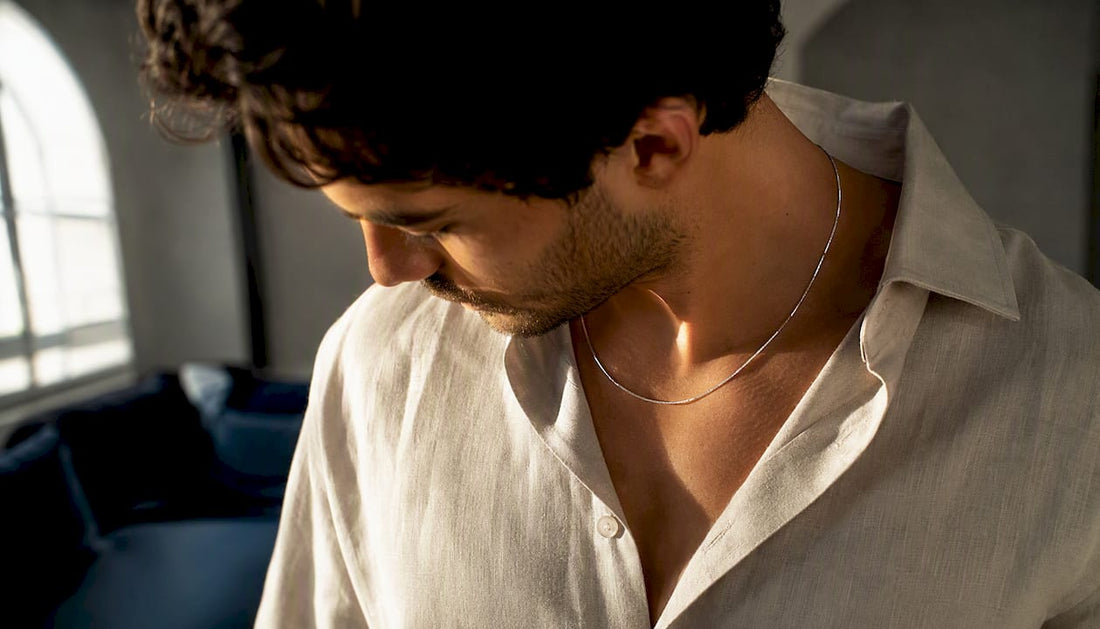 Man wearing slim sterling silver chain