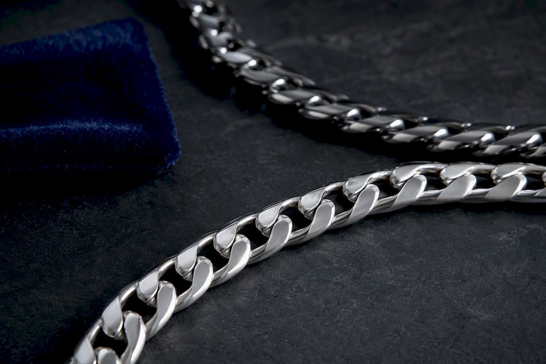 Cropped silver and platinum chain sections