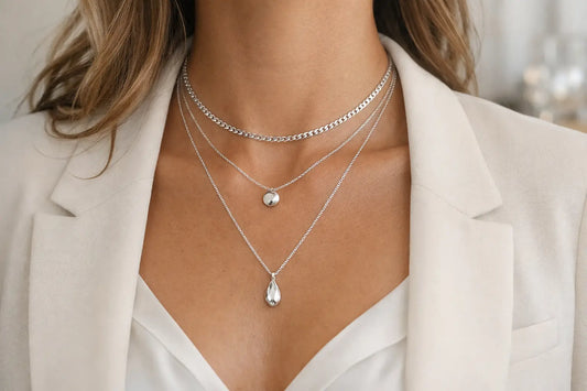 How to Layer Silver Necklaces That Work